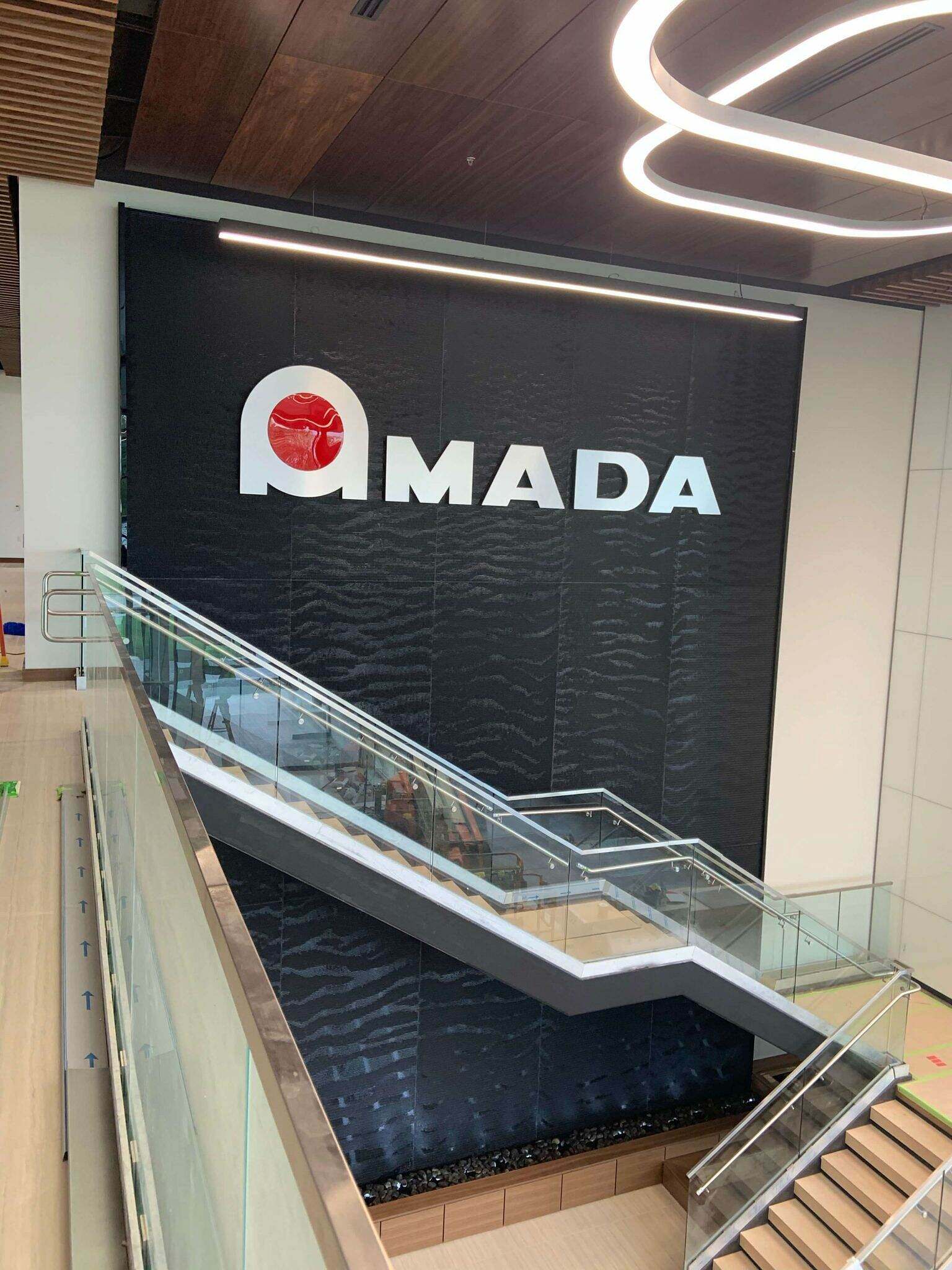 Black Scored Acrylic Water Wall at Amada Offices in High Point NC 4 scaled 1