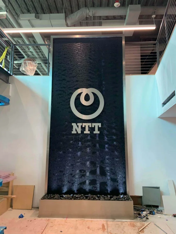 Black Scored Acrylis Water Wall with Stainless Steel Frame for NTT Secure 24 in Southfield, Michigan