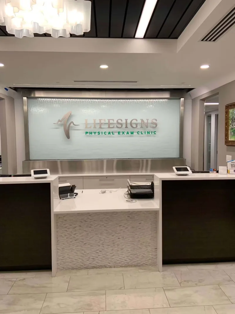 Glass Water Wall with Stainless Steel Frame and Off Mounted Logo for Lifesigns in Memphis, TN