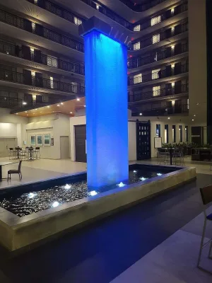 Mesh Water Wall Four Sided Column at Embassy Suites Miami Airport