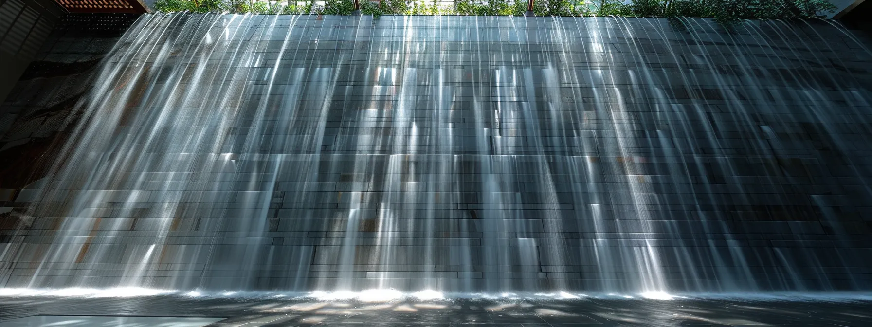 an awe-inspiring water curtain wall gleaming in the sunlight, showcasing innovative design and artistic beauty.